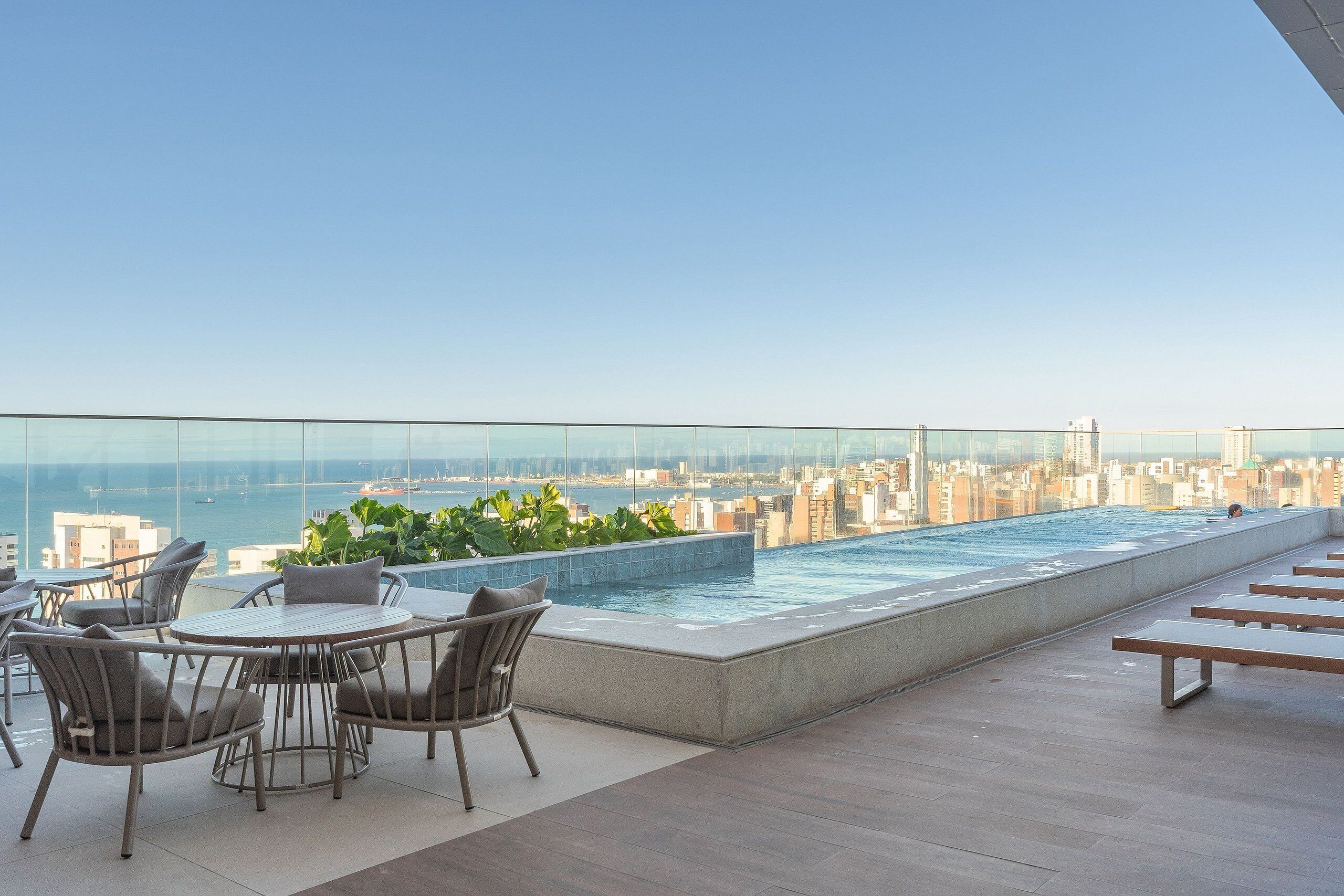 Indoor pool, pool umbrellas, pool loungers