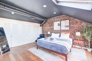 1 bedroom, desk, iron/ironing board, travel crib