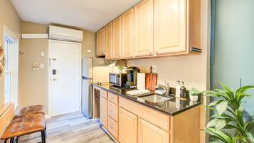 Fridge, microwave, stovetop, coffee/tea maker