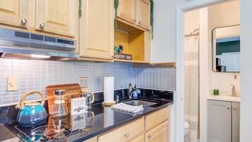 Fridge, microwave, stovetop, coffee/tea maker