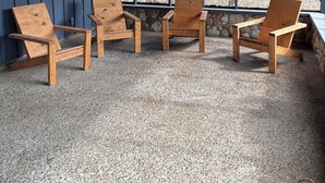 A covered patio area with four wooden chairs and two ceiling fans. - Country Home, 4 Bed, 3.5 Bath, Pet Friendly (Warren)