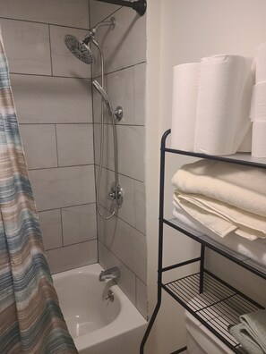 Shower, towels, soap, shampoo