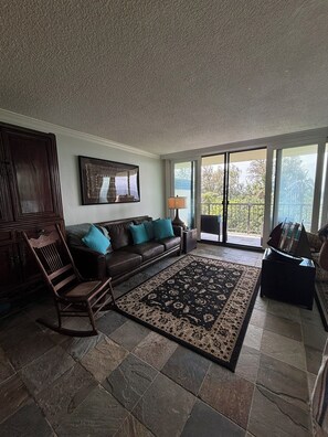 Living area - Stunning Ocean Front views, 2-bedroom condo w/ lanai next to Richardson's Beach (Hilo)