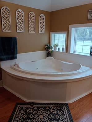 Shower, jetted bath, towels, soap