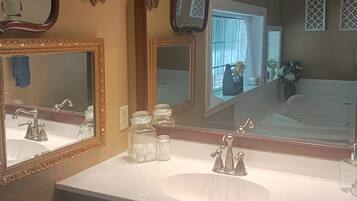 Shower, jetted tub, towels, soap