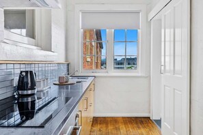 Fridge, microwave, oven, stovetop - Portsea - Heritage apartment by Salamanca (Battery Point)
