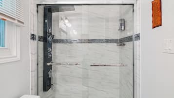 Shower, hair dryer, towels, soap