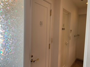 Hair dryer, towels, soap, shampoo