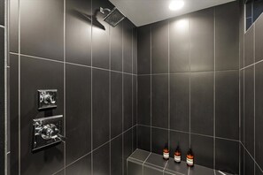 Shower, hair dryer, towels, shampoo