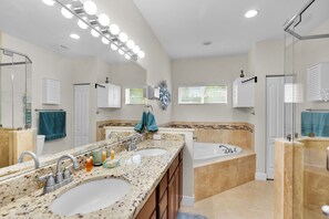 Shower, jetted tub, hair dryer, towels