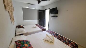 Family Twin Room, Patio | Desk, laptop workspace, free WiFi