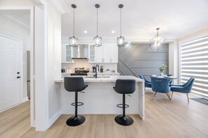 Fridge, microwave, oven, stovetop - Modern Retreat with Loft & Spa-Like Jacuzzi Tub (Brampton)
