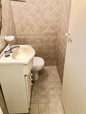 Hair dryer, bidet, towels, soap