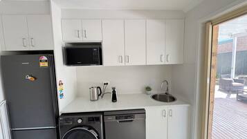 Fridge, microwave, dishwasher, coffee/tea maker