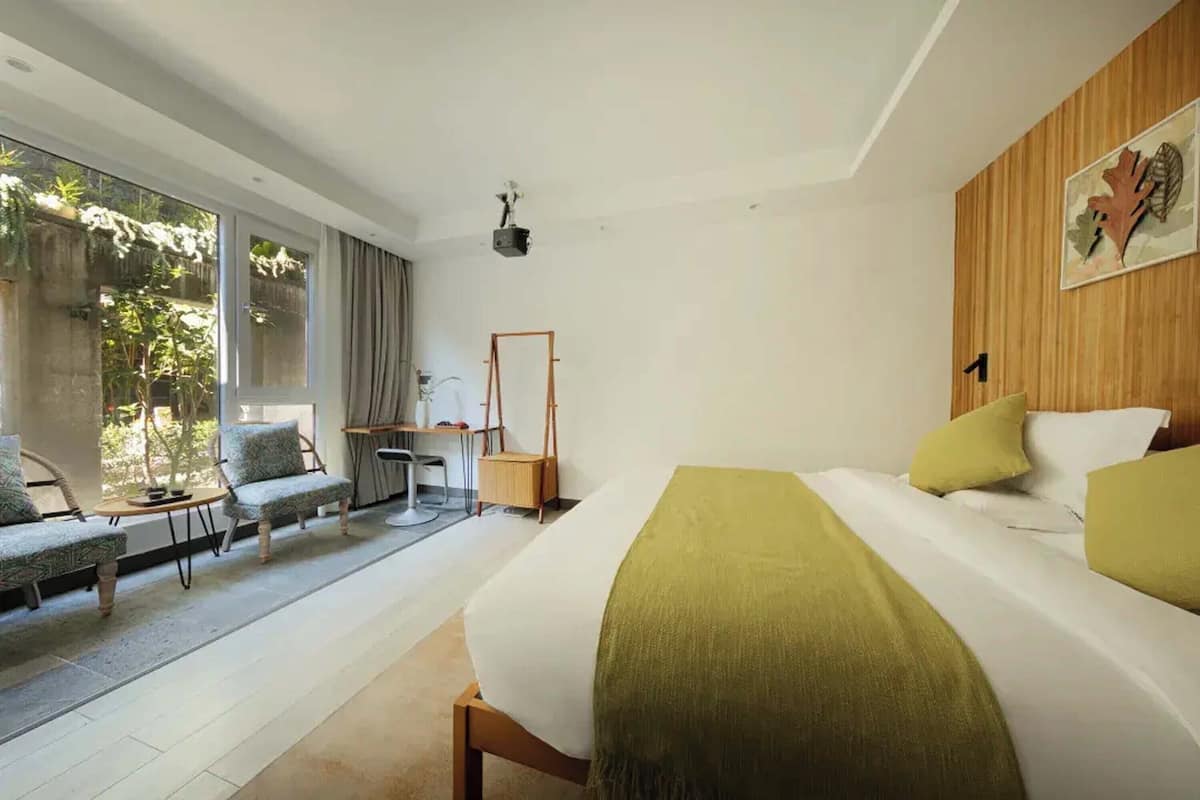 Classic Double Room, Garden View | Desk, laptop workspace, soundproofing, iron/ironing board