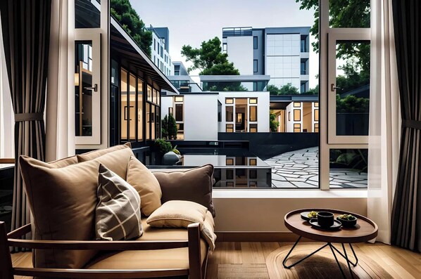 Luxe kamer, uitzicht op tuin | Een bureau, een laptopwerkplek, geluiddichte muren