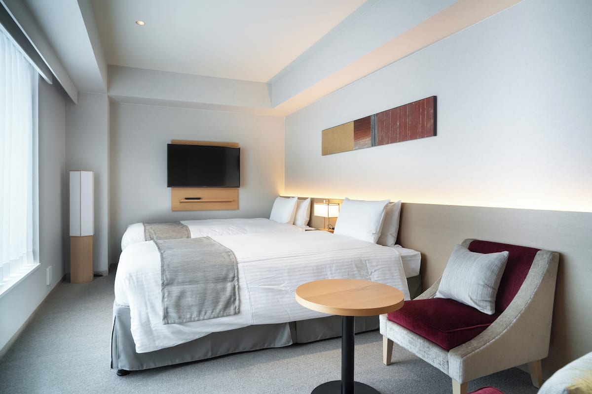 Executive Double or Twin Room | Down comforters, in-room safe, desk, laptop workspace