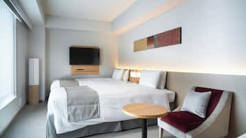 Habitación ejecutiva con 1 cama matrimonial o 2 individuales | Edredón, caja de seguridad en la habitación y escritorio
