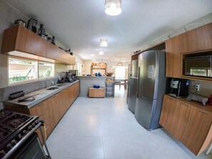 Villa | Private kitchen | Dining tables