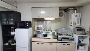 Fridge, microwave, cookware/dishes/utensils