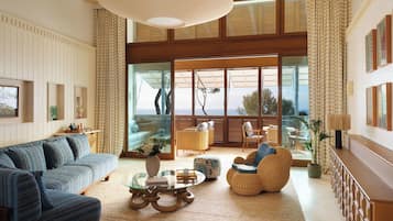 Suite (Punta Negra) | Woonruimte | Een 50-inch ledtelevisie met kabelzenders