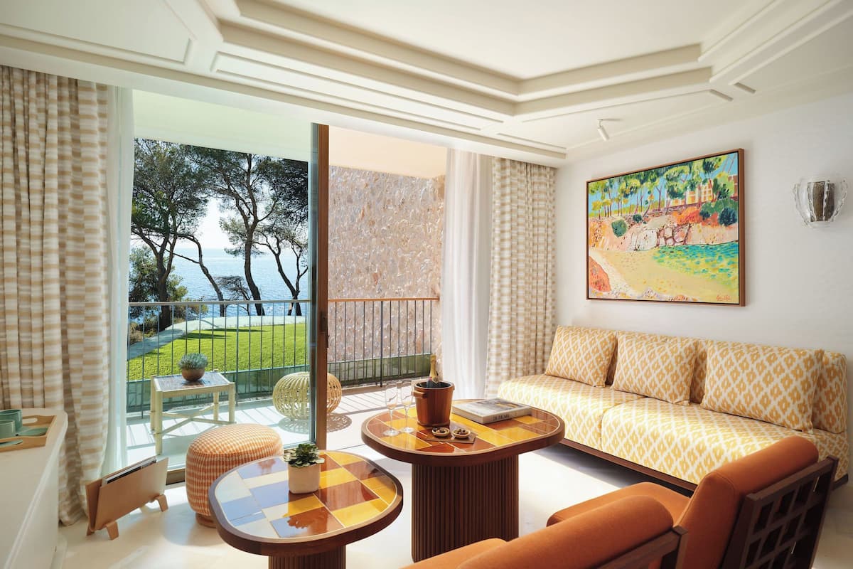 Suite, Sea View | Minibar, in-room safe, individually decorated, individually furnished