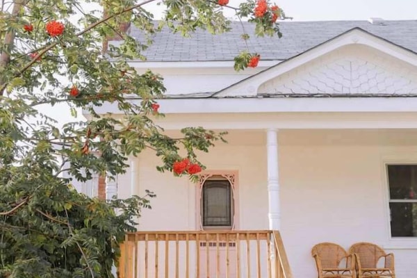 Come enjoy a beverage on the beautiful porch at Wild Rose