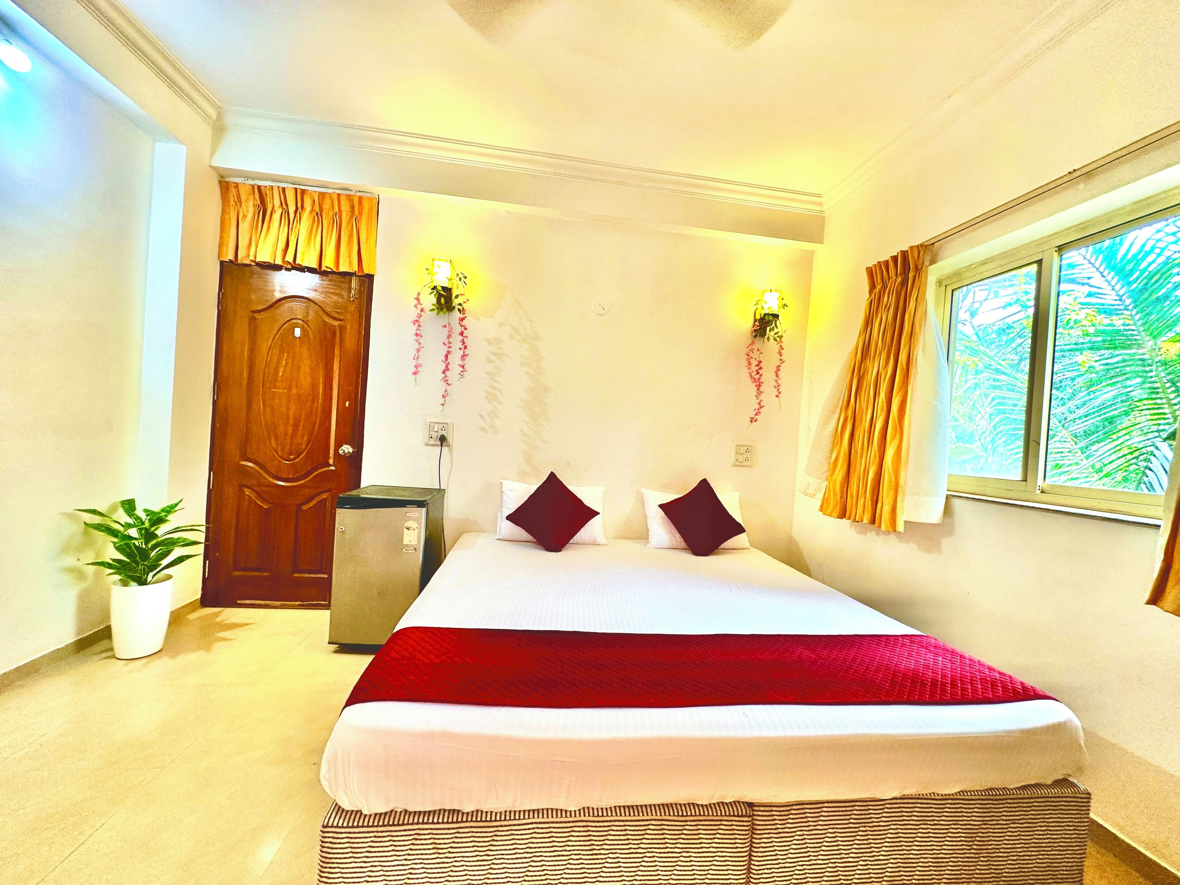 Habitación Deluxe, 1 cama de matrimonio grande, Aire acondicionado, frente a la playa | Wifi gratis y ropa de cama