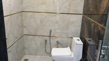 Shower, free toiletries, towels, soap