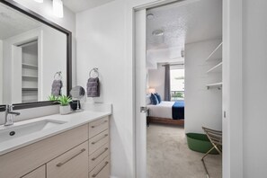 1 bedroom, desk, iron/ironing board, travel crib