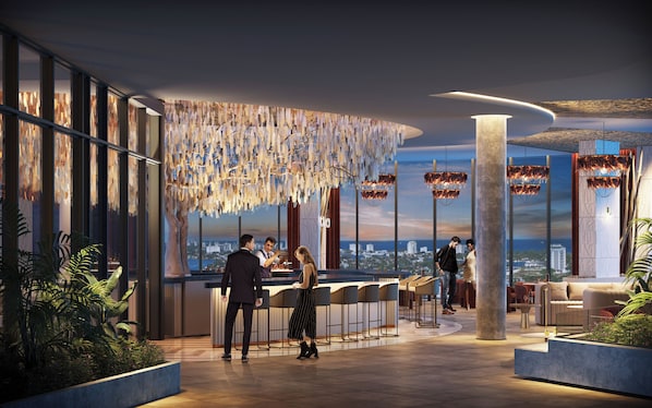 3 bars/lounges, lobby lounge, sports bar, rooftop bar