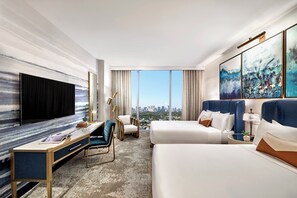 Luxe beddengoed, pillowtop-bedden, een kluis op de kamer, een bureau