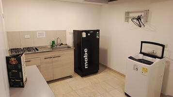 Family Apartment | Private kitchen | Mini-fridge, cookware/dishes/utensils