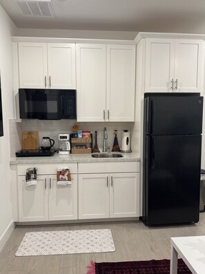 Fridge, microwave, coffee/tea maker, electric kettle