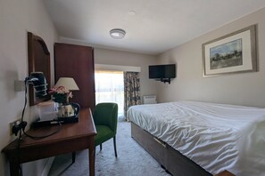 1 dormitori, planxa i posts de planxar i wifi 