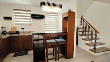 Fridge, stovetop, cookware/dishes/utensils