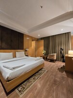 Deluxe Double Room | In-room safe, desk, laptop workspace, blackout drapes