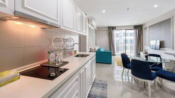Family Apartment, Balcony, City View | Private kitchen | Fridge, microwave, electric kettle, cookware/dishes/utensils
