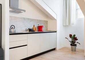 Leilighet – superior, 1 soverom | Eget kjøkken | Kjøleskap, kokeplater, espressomaskin og kjøkkenutstyr