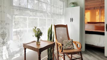 1 bedroom, desk, iron/ironing board, travel crib