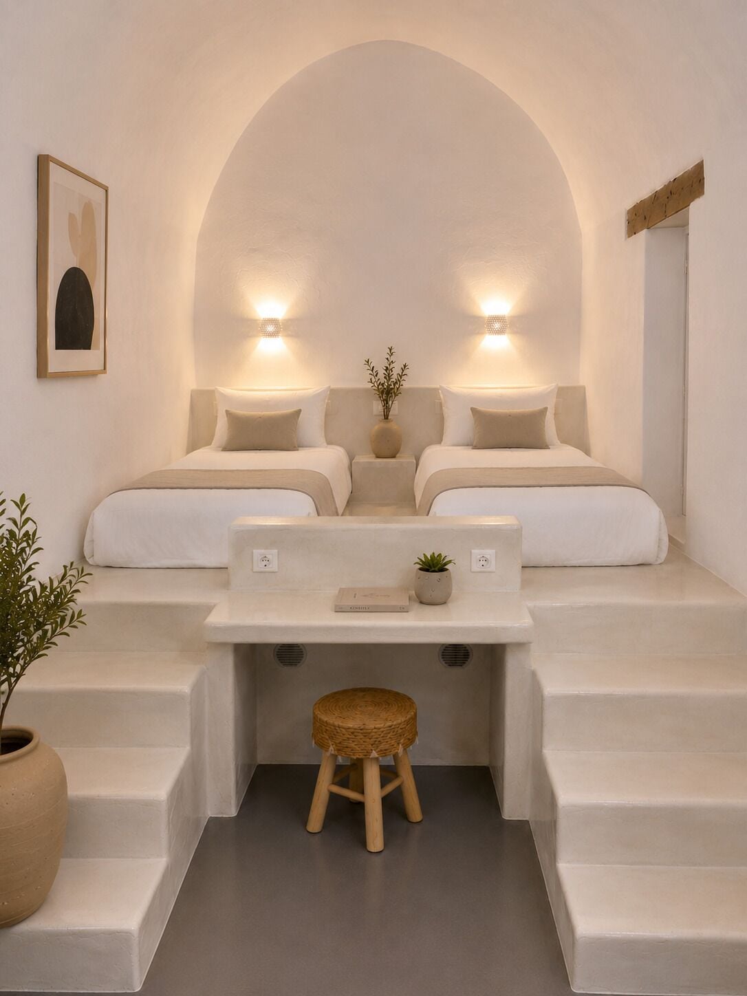 A minimalist room with two beds, a small table, a stool, and a potted plant.