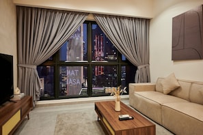 Deluxe Apartment, 2 Bedrooms, Balcony, City View | Living area