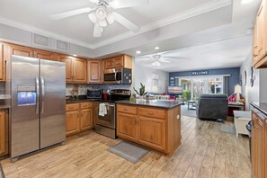 Fridge, microwave, oven, stovetop - Cozy Ground-Floor Condo | Walk to Beach, Pool & Flagler Dining (New Smyrna Beach)