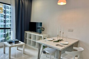 Superior Studio, 1 Queen Bed, Balcony, City View | Living area | 30-inch TV with cable channels