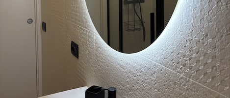 Hair dryer, towels, soap, toilet paper