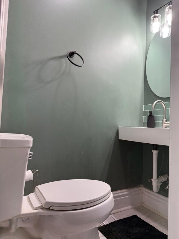 Shower, towels, soap, toilet paper