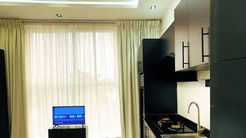 1 slaapkamer, een strijkplank/strijkijzer, wifi, beddengoed