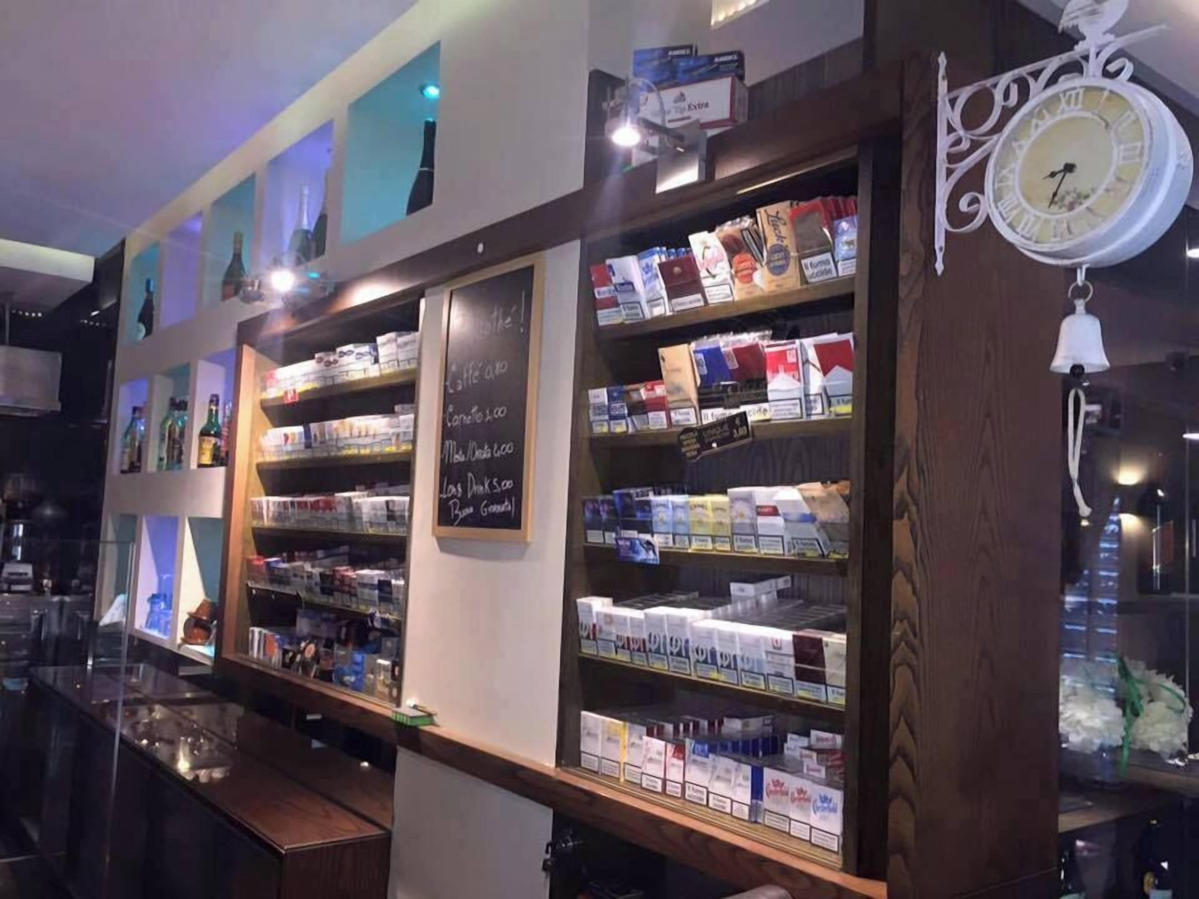 A pharmacy with shelves stocked with various health products.