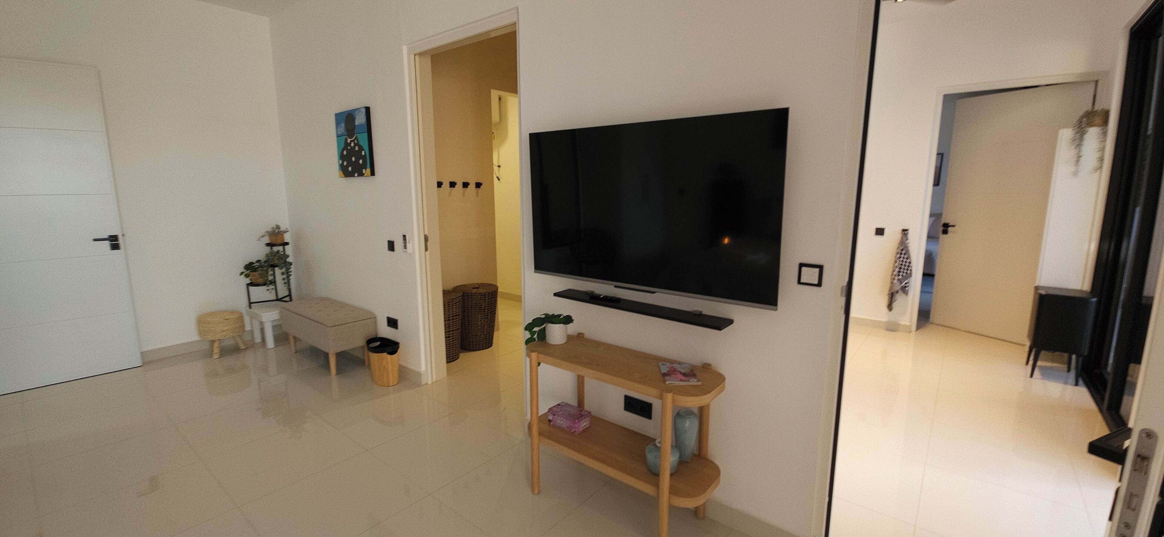 Appartement Deluxe, 2 chambres, patio, vue jardin | Coffres-forts dans les chambres, rideaux occultants