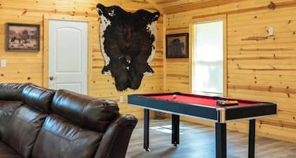 Cozy 2BR Retreat Near Lake Texoma<br>Just minutes from Lake Texoma and Cedar Mills Marina, this peaceful home offers modern comfort, a full kitchen, and fun extras like a pool table and table tennis—perfect for couples, families, or friends.